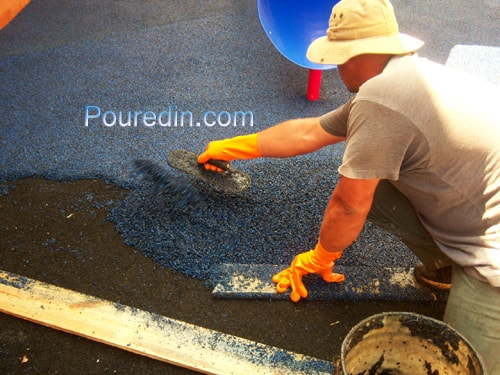 troweling poured in place rubber