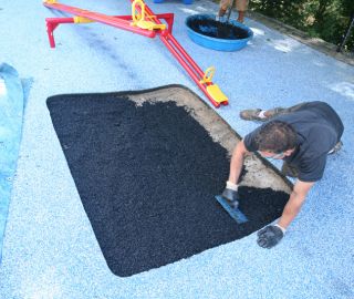 How to repair playground rubber surface with base layer patch kit.