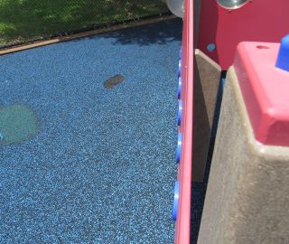 Playground surface damage.