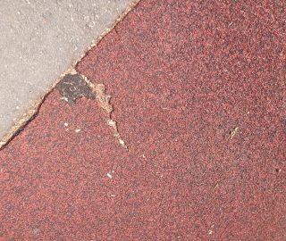 Easily fixed with a patch via our poured in place repair kits.