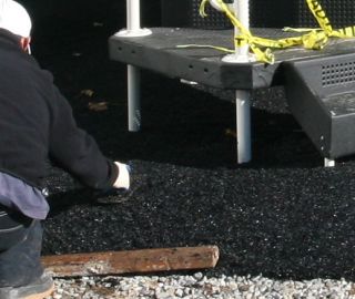 Base layer install for EPDM playground surfacing.